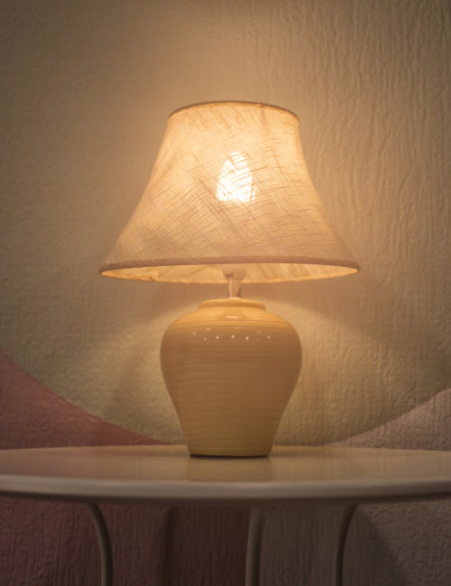 Man and woman sitting on a bed